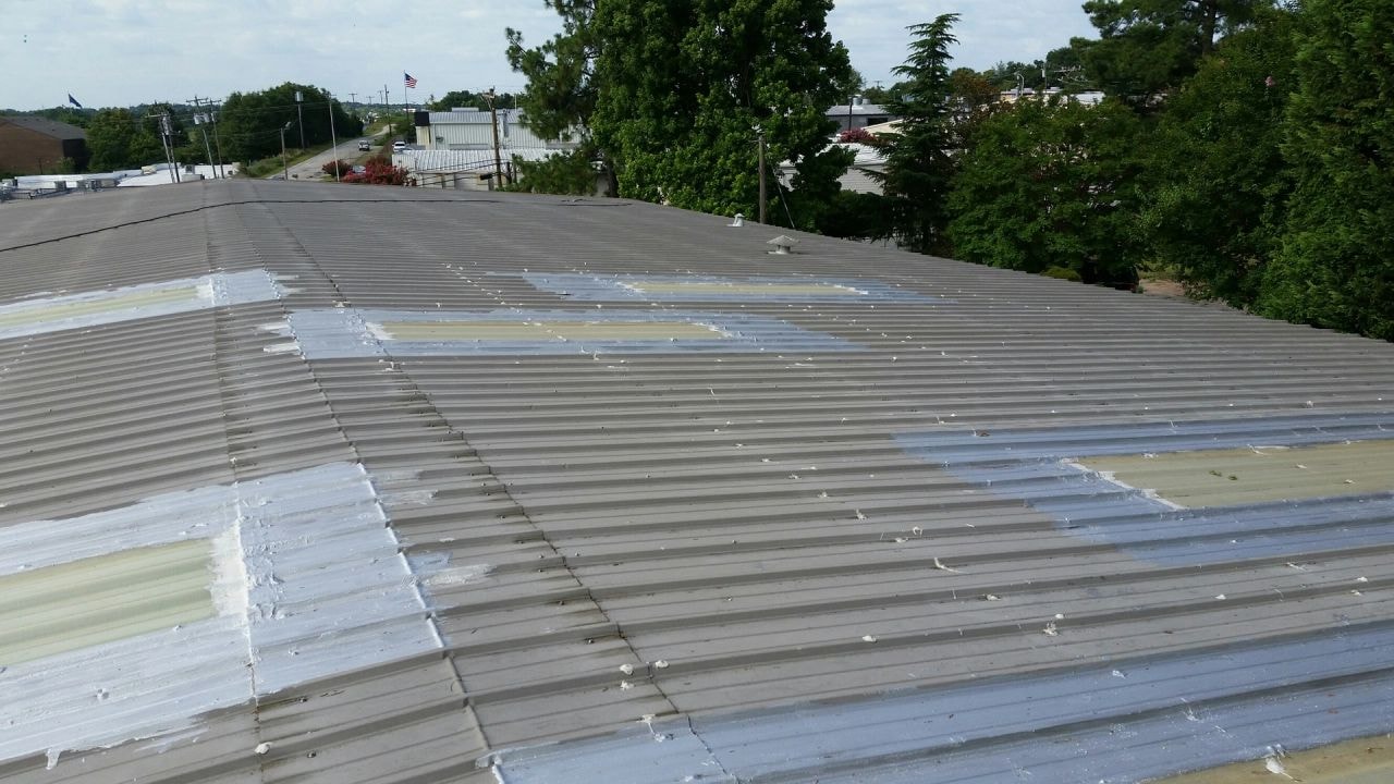 Roof coating after — bright white finished metal roof